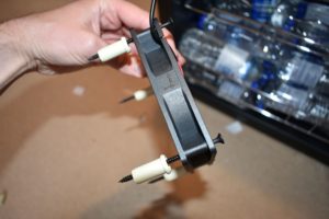 How to place spacers behind fan